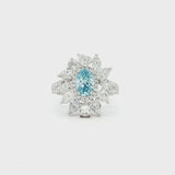 18K_White_Gold_Fancy_Blue_Lab_Grown_Diamond_Floral_Statement_Cocktail_Evening

This 18K White Gold Ring showcases an exquisite floral design with a captivating oval-cut blue diamond centre, framed with white diamond "petals". A timeless embodiment of luxury and sophistication, perfect for making a statement!