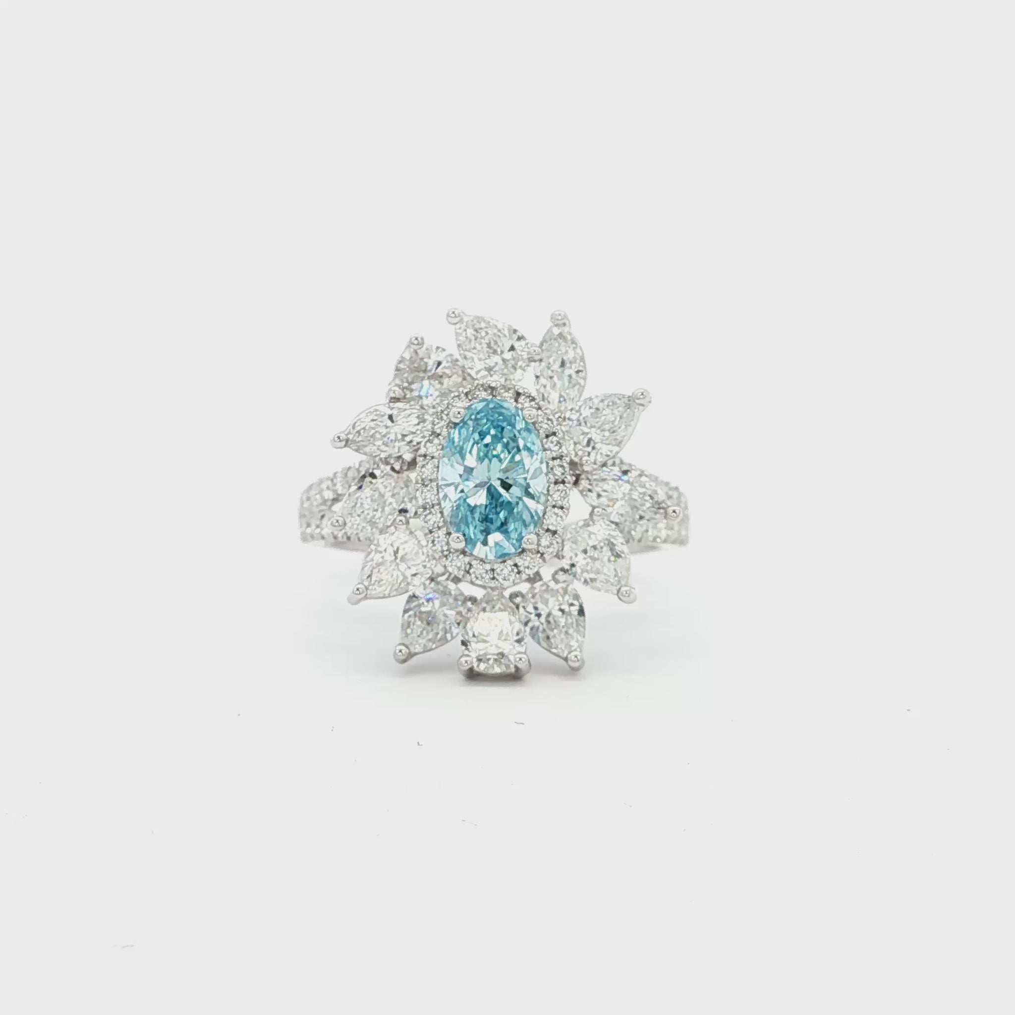 18K_White_Gold_Fancy_Blue_Lab_Grown_Diamond_Floral_Statement_Cocktail_Evening

This 18K White Gold Ring showcases an exquisite floral design with a captivating oval-cut blue diamond centre, framed with white diamond "petals". A timeless embodiment of luxury and sophistication, perfect for making a statement!