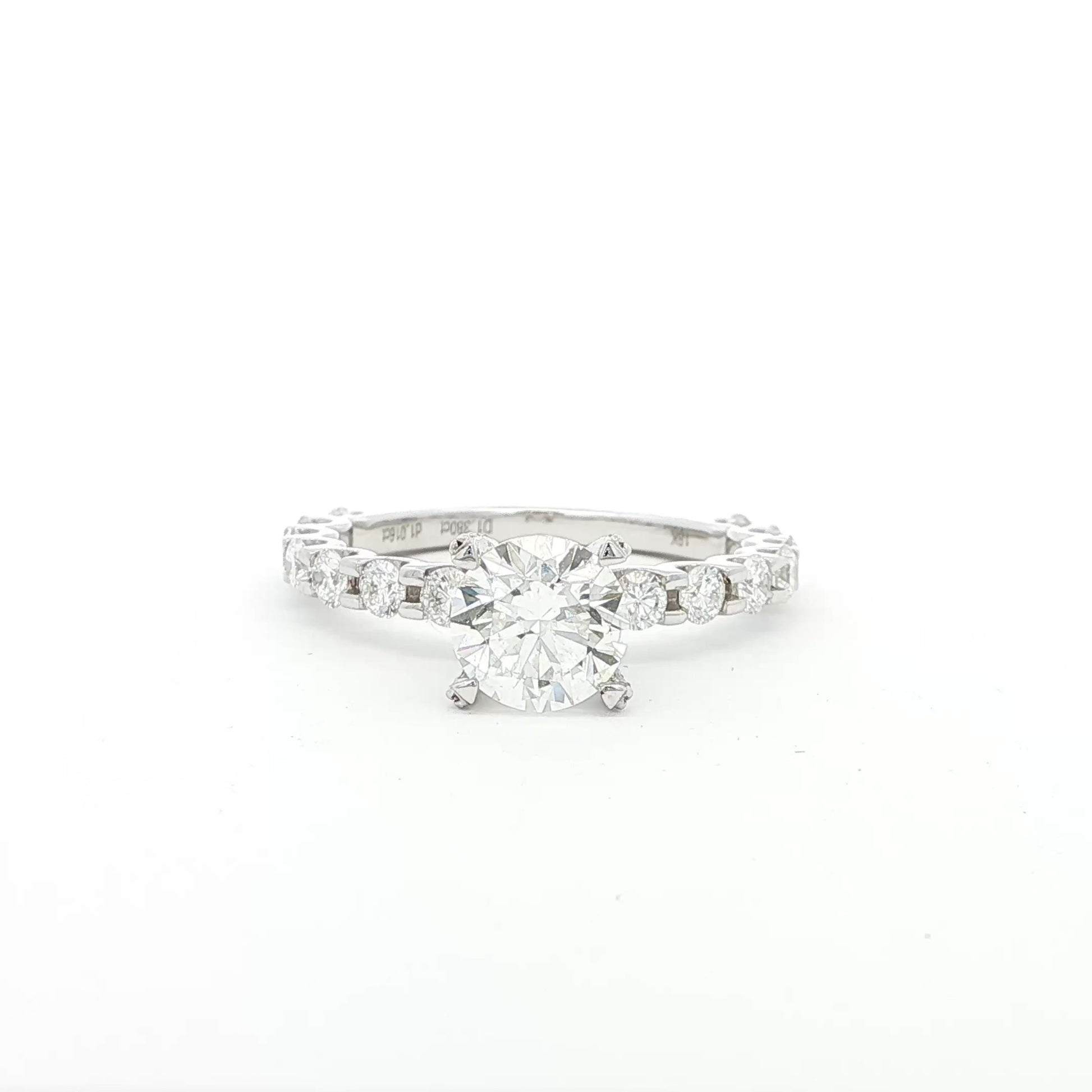 18K_White_Gold_Lab_Grown_Diamond_Ring_Engagement_Fancy_Brilliant_Round_Cut

This 18K White Gold ring features a classic round-cut centre, accentuated by round side stones along the band. This timeless design offers the perfect blend of elegance and sophistication, making it the perfect choice for an engagement ring!