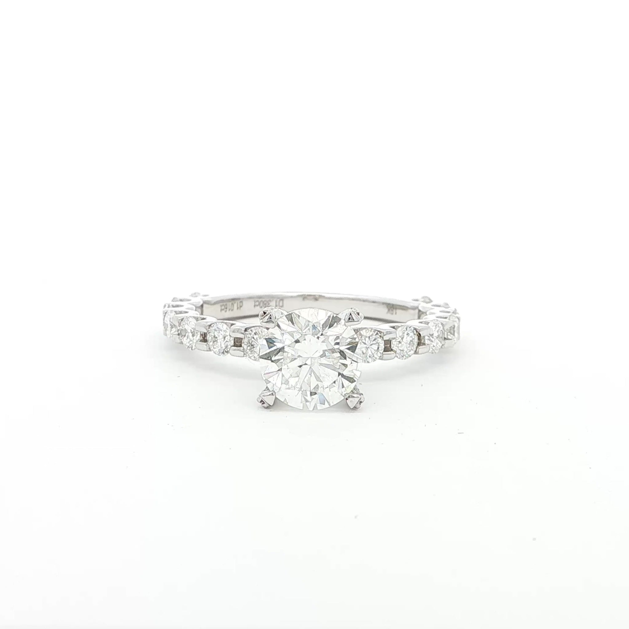 18K_White_Gold_Lab_Grown_Diamond_Ring_Engagement_Fancy_Brilliant_Round_Cut

This 18K White Gold ring features a classic round-cut centre, accentuated by round side stones along the band. This timeless design offers the perfect blend of elegance and sophistication, making it the perfect choice for an engagement ring!
