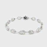 18K White Gold Fancy Shape Pear, Oval, and Princess-Cut Bezel-Set Lab-Grown Diamond Bracelet 

A chic, architectural pattern of bezel-set Pear, Oval, and Princess-Cut Lab-Grown Diamonds, each stone distinctly separated along the bracelet. Timelessly luminous and versatile — perfect for elevating everyday looks or pairing with evening wear.
