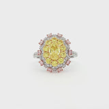 18K_Yellow_Gold_Lab_Grown_Diamond_Ring_Statement_Cocktail_Engagement_Evening

This 18K Yellow Gold ring showcases a vibrant center of brilliant yellow diamonds, elegantly encircled by a halo of pink and white diamonds. The bold contrasts of colors create a captivating play of light, making it a true statement piece for any occasion.