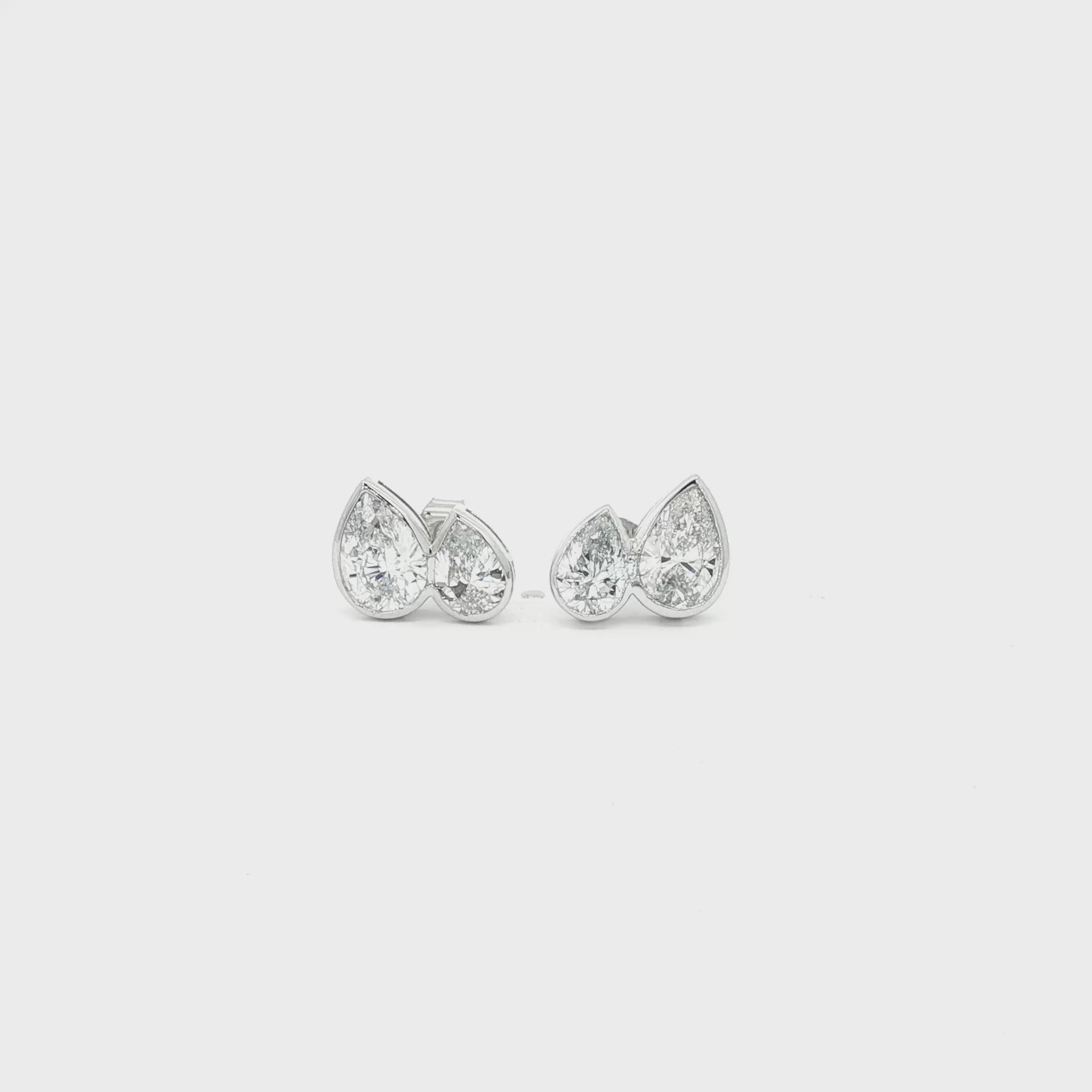 Pear lab grown diamond stud earrings in bezel set, toi et moi style