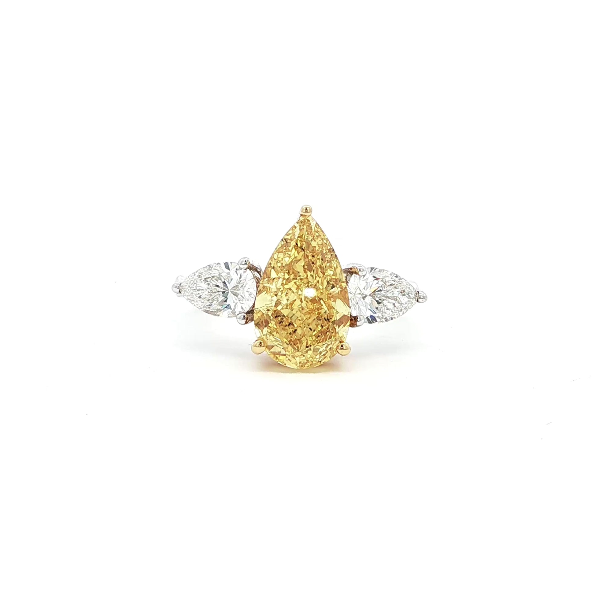 18K_White_Gold_Fancy_Yellow_Pear_Cut_Lab_Grown_Diamond_Trilogy_Ring

This 18K White Gold ring features a fancy yellow pear-cut diamond at its centre, framed by two pear-cut side stones. Perfect for special occasions or as a statement piece in your everyday jewelry collection!