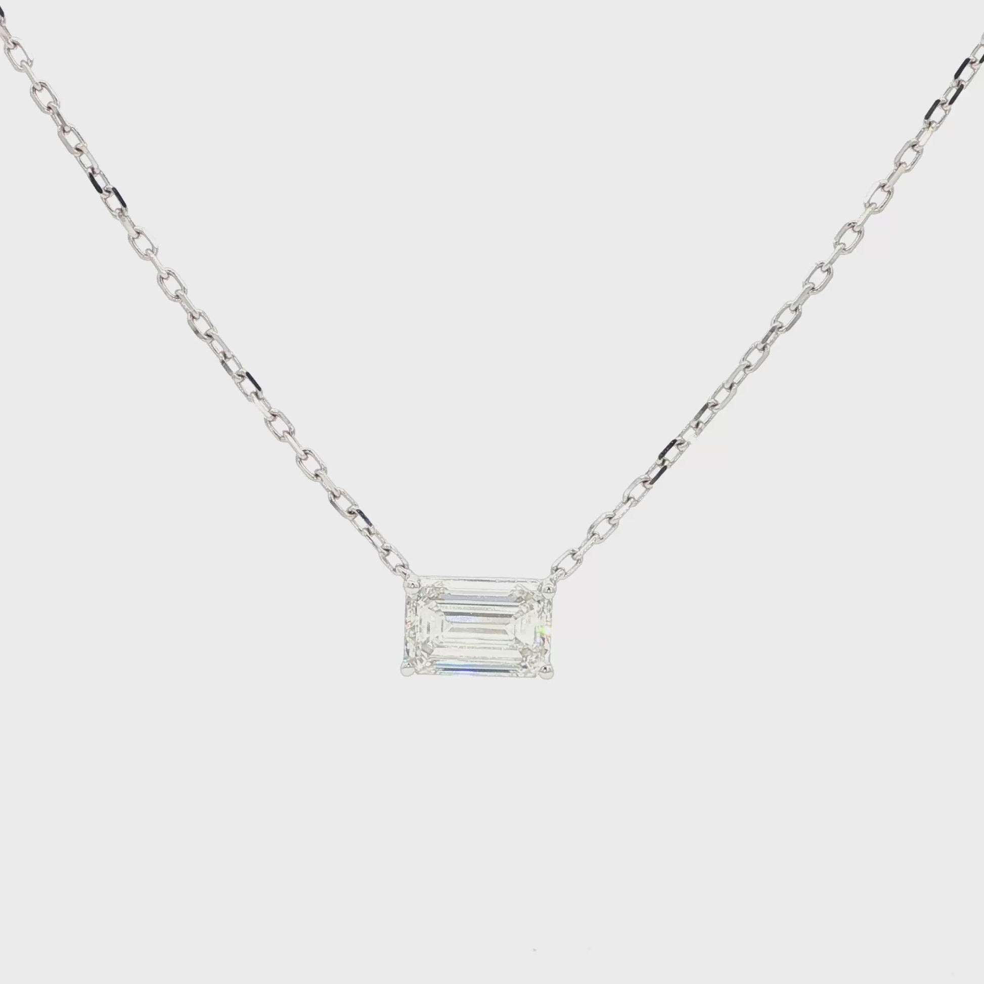 Lab-grown emerald diamond pendant necklace in 18k white gold.
