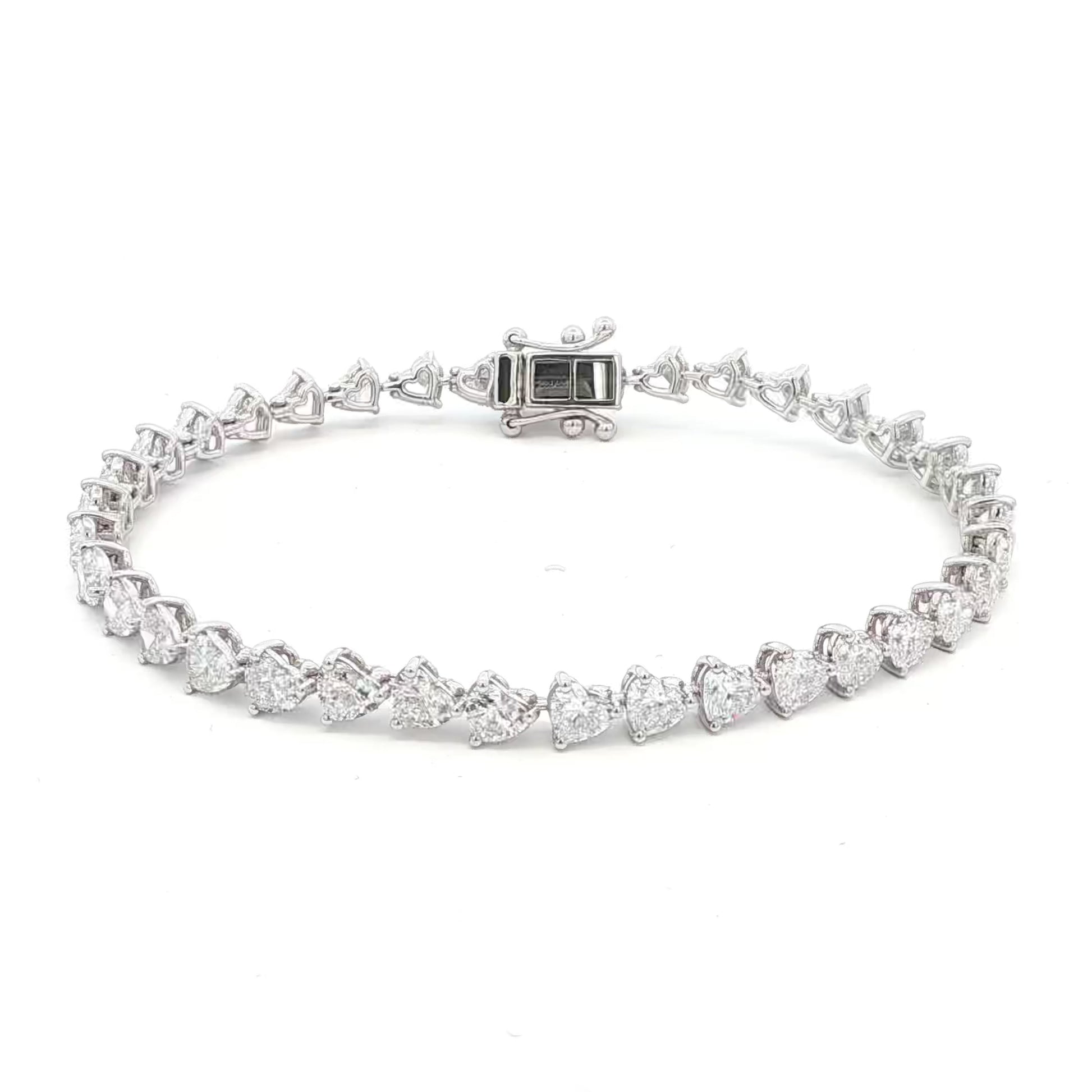 18K White Gold Heart-Cut Lab-Grown Diamond Tennis Bracelet

An endless line of heart-cut diamonds set in 18K White Gold. This Lab-Grown Diamond Tennis Bracelet delivers exceptional brilliance, blending romance with modern luxury for timeless wear.
